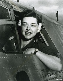 #4 WASP (Woman Airforce Service Pilot) leaning out of cockpit